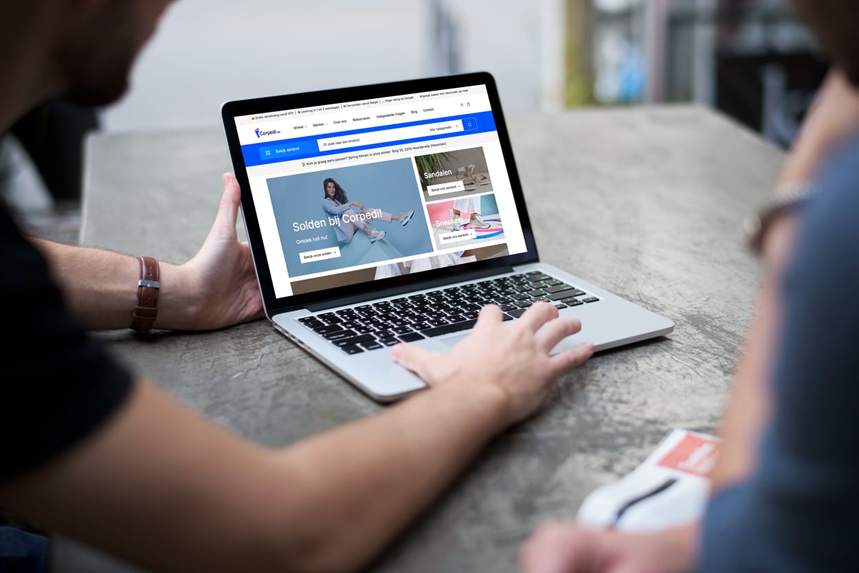 mockuuups man working on a macbook pro mockup